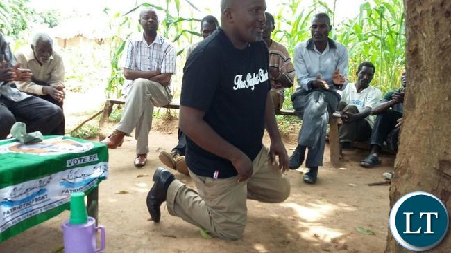 Lundazi businessman Evans Kazonga Ngoma when he distributed meal meal to people over the weekend.