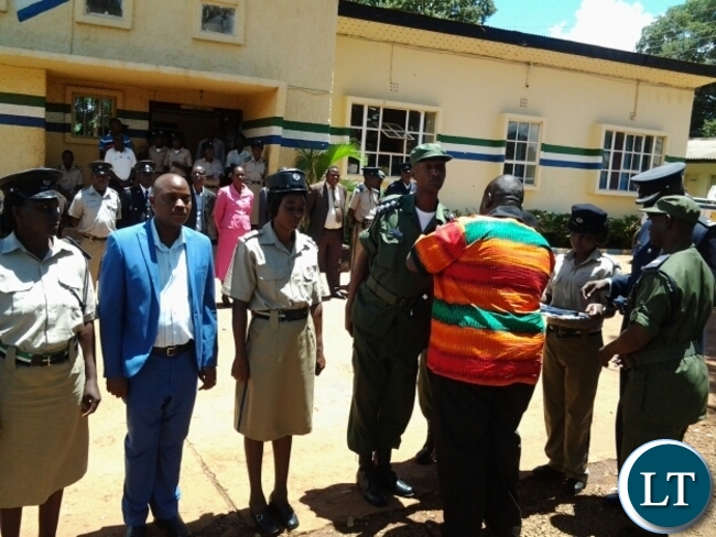 CHIPATA District Commissioner Kalunga Zulu inspecting a guard of honour during Zambia Police Service open day at Chipata Central Police