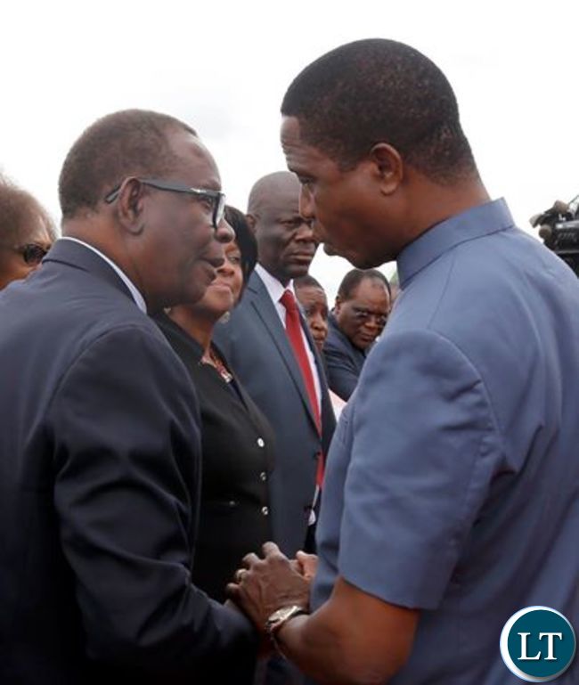 President Lungu chats with Health Minister Kasonde before departure to Mozambique