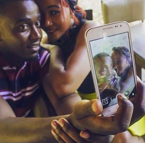 Grace as 'Mwaka' with co-star Sam Sakala as 'Taonga'