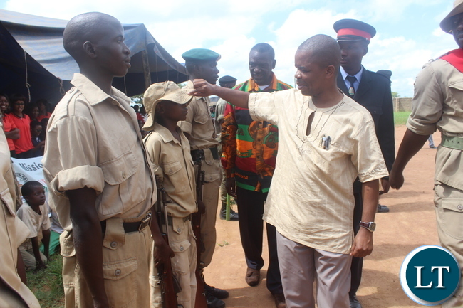 Deputy Minister of Education Mr. Sydney Mushanga inspects a guard of honour mounted by cadets from Monze Secondary School during the Youth Day Celebrations held under the theme, “Youth: Champions of Dialogue, Peace, Unity and Economic Emancipation”. Deputy Minister of Education Mr. Sydney Mushanga inspects a guard of honour mounted by cadets from Monze Secondary School during the Youth Day Celebrations held under the theme, “Youth: Champions of Dialogue, Peace, Unity and Economic Emancipation”.