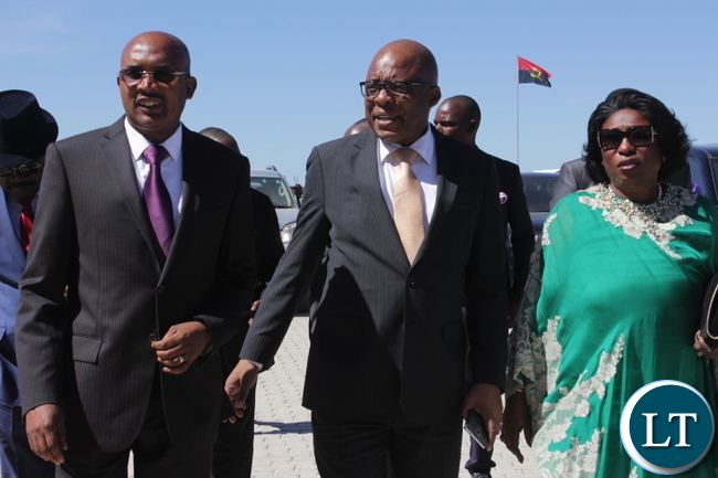 Angolan Secretary General for the Ministry of Foreign Affairs Eduardo De Jesus (c) flanked by his Angolan Ambassador to Zambia Balbina Dias Da Silva (r) and Angolan Consul General for Mongu Domingo Mazala Ricardo (l) on arrival at the Inauguration Ceremony for the Consulate of the Republic of Angola in Mongu