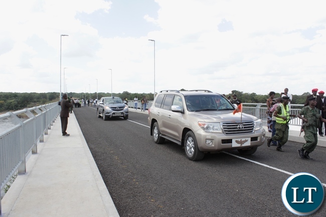 Presidential Motor Cade crossing Sioma Bridge after the official commissioning of the bridge built at a cost of K108.2million in Sioma District of Western Province