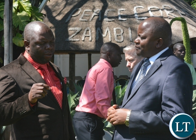 His Royal Highness Chief Chamuka of Chisamba District(l) having a light moment with Lands,Natural Resources and Environmental Protection Deputy Minister Davis Mwango(r) immediately after the swearing in ceremony for rural aquaculture promotion and linking income,food and environment project volunteers