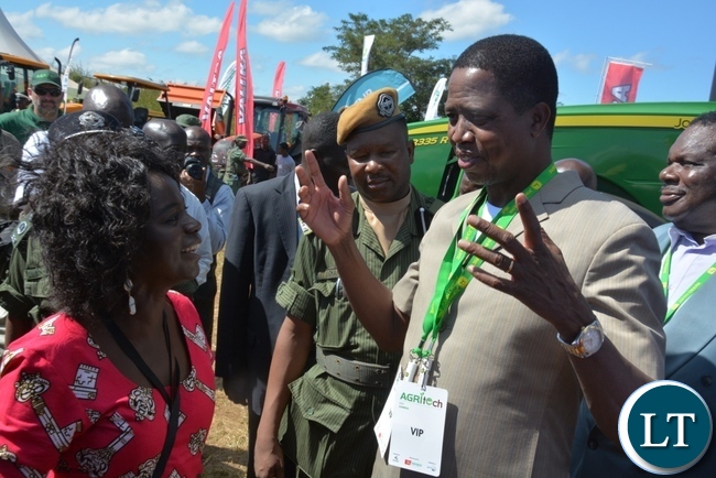President Lungu speaking to ZNFU president Evelyn Nguleka at official opening of Agritech Expo 2016 in Chisamba Central Province President Lungu speaking to ZNFU president Evelyn Nguleka at official opening of Agritech Expo 2016 in Chisamba Central Province