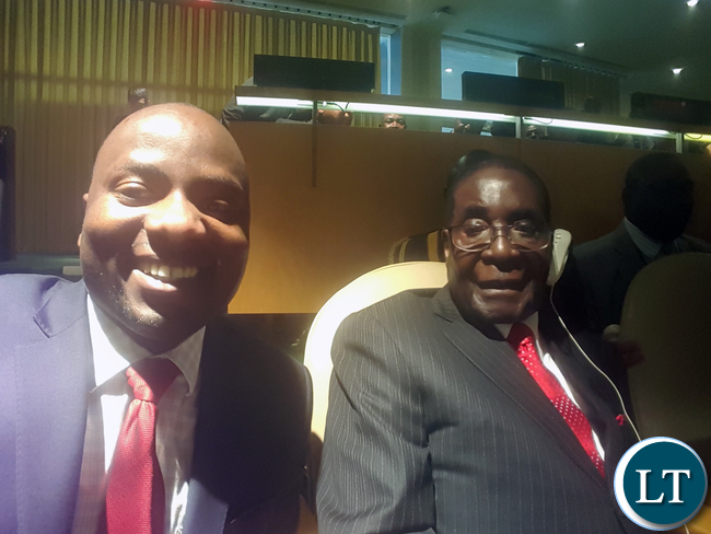Chibaula Silwamba and President Robert Mugabe at Paris Agreement signing ceremony