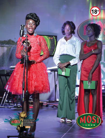 DJ Linzee 4FM ZNBC with her trophy, having accepted it from MaFashio