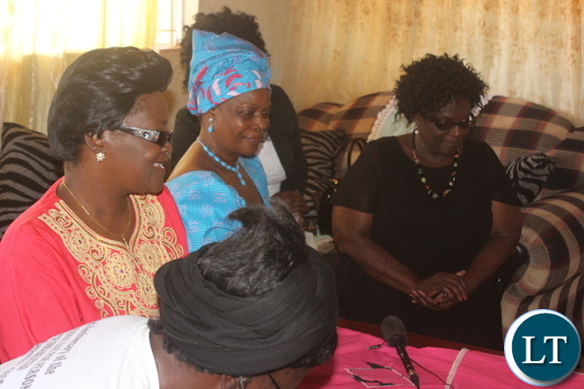 First Lady Esther Lungu (in blue),Central Province Permanent Secretary Daisy Ngambi (right) and Mkushi North MP Ingrid Mphande paying homage to chief Chitina of the Lala speaking people (not in picture) during the First Lady's outreach program in Mkushi District.Picture