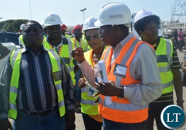 Works and Supply Minister Yamfwa Mukanga (far left), Road Development Agency (RDA) director in charge of communications and corporate affairs Royce Saili (far left), Kazungula Bridge Project Team Leader Kabamelo Kgoboko (next to Ms Saili) and Kazungula District Coommissioner Pascalina Musokotwane (next to Mr Kgoboko). This was on Sunday this week when Mr Mukanga and his delegation inspected the construction of the Bridge at Kazungula Border