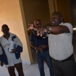 State House Special Assistant for Project Monitoring and Implementation Lucky Mulusa (right), Livingstone Town Centre Modern Market contractor and Matty Construction Limited managing director Herbert Yassin Phiri (middle) as well as Town Centre Modern project quantity surveyor Geofrey Iyombwa (left) during the tour of the market under construction in Livingstone