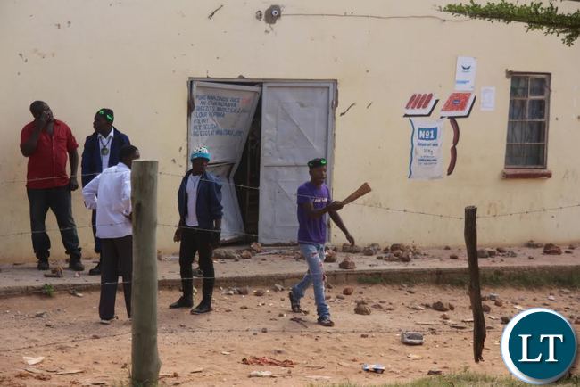 PF Cadres trying to stop the looting of Rwandese Refugees owned shops