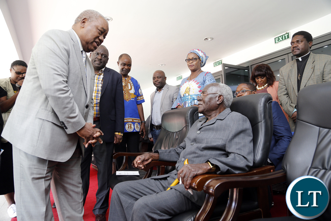 Former President Mr Rupiah Banda greets Mr Grey Zulu at the Reformed Church in Zambia,Golden Jubilee celebration in Lusaka at heroes stadium, Umwini inaugurated a new era in the history of the Reformed Church in Zambia.The Church in Zambia was governed by missionaries from the Dutch Reformed Church Free State of South Africa.Picture by EDDIE MWANALEZA/STATEHOUSE.23-04-2016