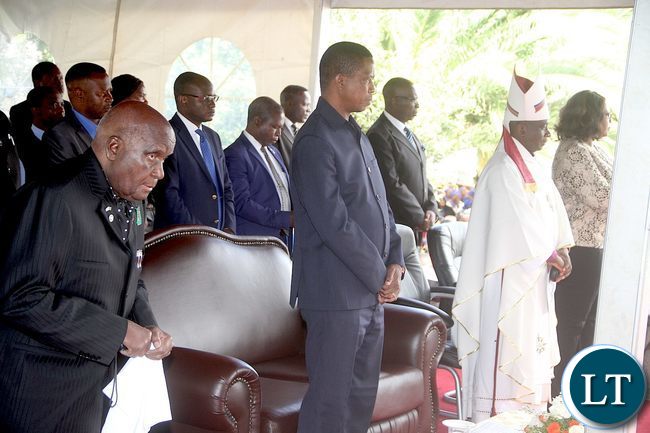 President Lungu, First Republican president Dr Kenneth Kaunda and Bishop Kamukwamba observing a minute of silence in honour of 25 people who died in a road traffic accident which happened at Luanshimba between Kabwe and Kapiri Mposhi districts in Central Province. This was during the opening Eucharistic Service of the 16 th Session of the Anglican Consultative Council at the Cathedral of the Holy Cross on Sunday, April 10,2016 –Picture by THOMAS NSAMA