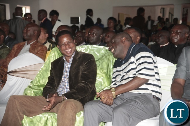 President Lungu attending a Church Service in Chipata President Edgar Lungu singing a song shares a light moment with PF secretary General Davies Chama Left When he attended a church service at Blessed of Hope Church