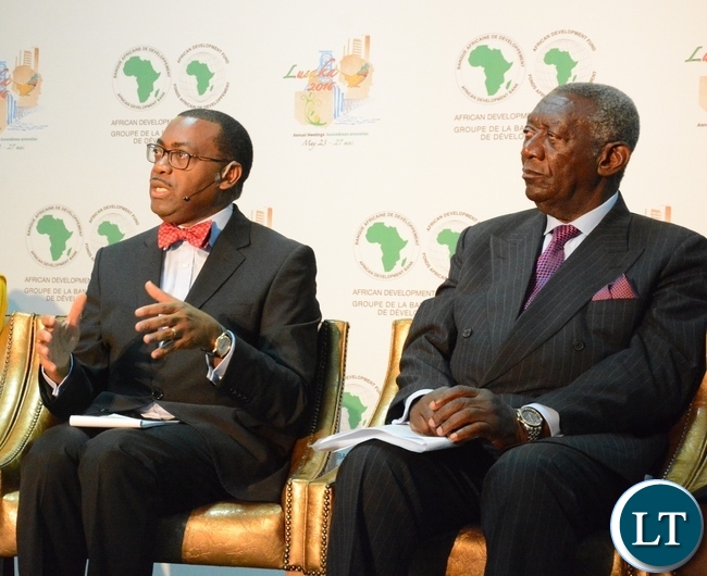 African Development Bank President Akinwumi Adesine speaking whilst former President of Ghana John Kufour listens at the Achieving Nutritional Security conference African Development Bank President Akinwumi Adesine speaking whilst former President of Ghana John Kufour listens at the Achieving Nutritional Security conference