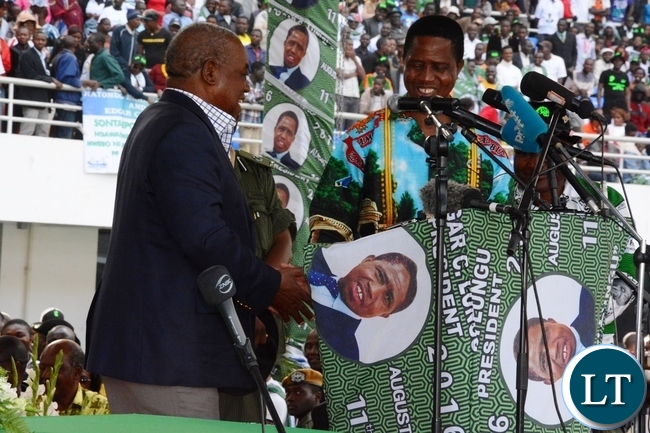 President Edgar Lungu welcomes Fourth Republican President Rupiah Banda at the lunch of PF Campaign in the Heroes Stadium