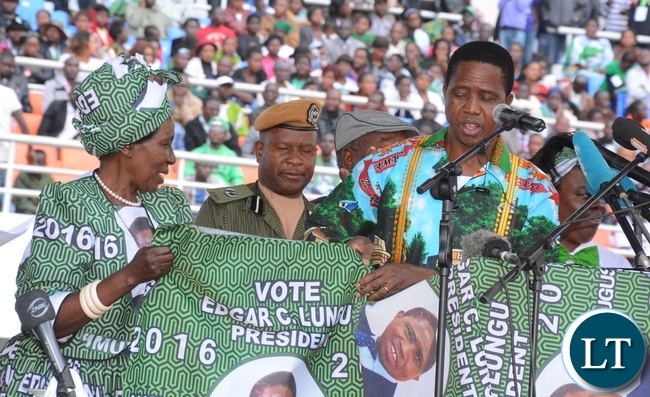 President Lungu and Vice President Inonge Wina looking at the PF new material at the lunch of PF Campaign in the Heroes Stadium