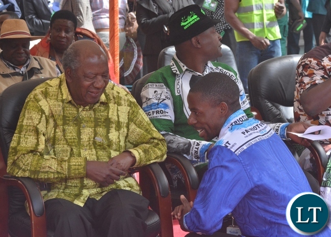 Minister of Finance Alexander Chikwanda(l) welcomes Former Member of Parliament for Mufumbwe Stephen Masumba(r) during the Launch of the PF Campaign at Heroes Stadium y