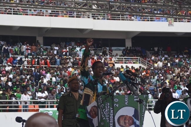 President Edgar Lungu flashes the PF symbol during the Launch of the PF Campaign at Heroes Stadium