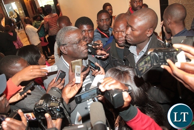 UPND Secretary General Stephen Katunka(c) having an interview with the Journalists immediately after the briefing of Aspiring Presidential Candidates,Running mates and their Agents at Intercontinental Hotel in Lusaka