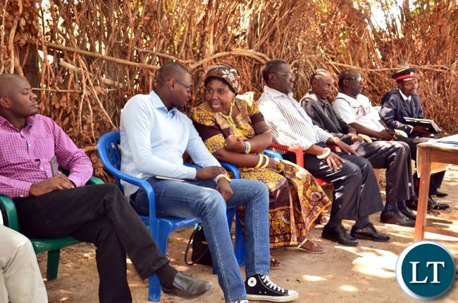 CSO-SUN Acting Country Coordinator Eneyah Phiri chats with wife to Chief Mwansabombwe who is the Ambassador against early marriages