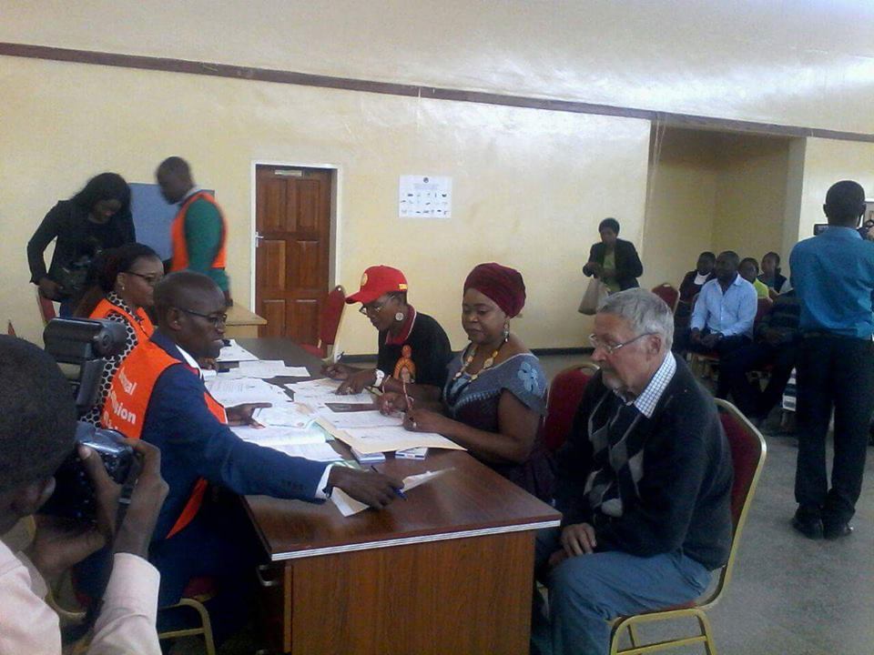 Dr Guy Scott flanked by Slyvia Masebo at Civics Centre
