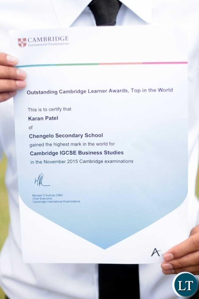Karan shows off his certificate