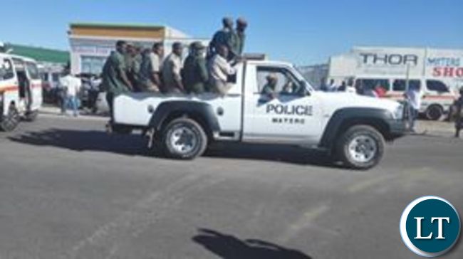 Police in Matero approaching the venue of the rally before tear gased the crowd