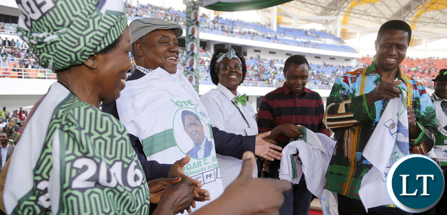 President Lungu Presates a Tshirt to Former President Rupiah Banda at Heroes Stadium in Lusaka 1