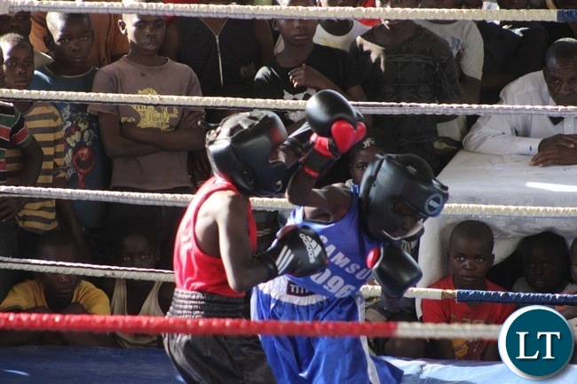 Young Pugilists slug it out an under-15 Samsung Boxing Youth Sport Challenge staged at the Olympic Youth Development Centre