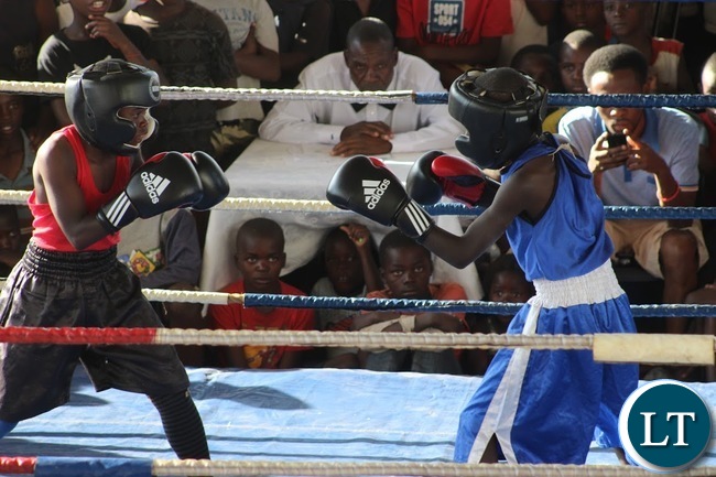 Young Pugilists slug it out an under-15 Samsung Boxing Youth Sport Challenge staged at the Olympic Youth Development Centre