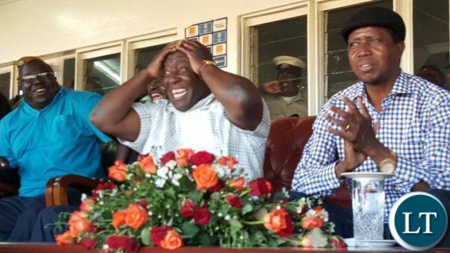 Copperbelt Minister Menye Musenga , Chishimba Kambwili watching a football match over the weekend