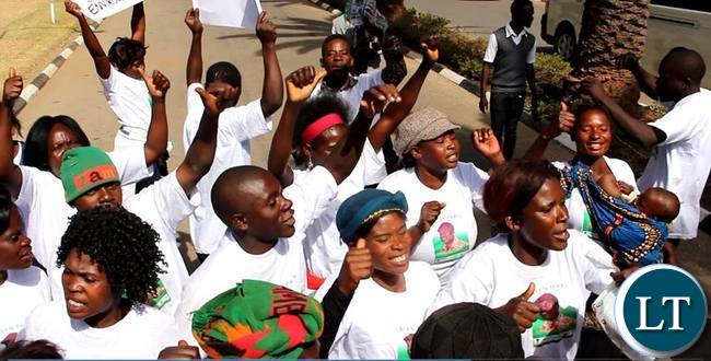 Green Party members march into Mulungushi Conference Centre during the filing in of presidential nomination papers
