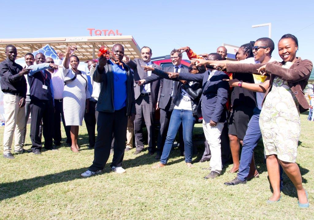 Man of the moment Ronald Kabamba with keys to his brand new Renault Duster. Picture courtesy of KPR Consulting