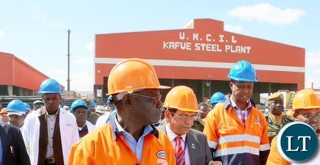 President Edgar Lungu Pose with Workers at Universal Mining and Chemical Industrial plant in Kafue-