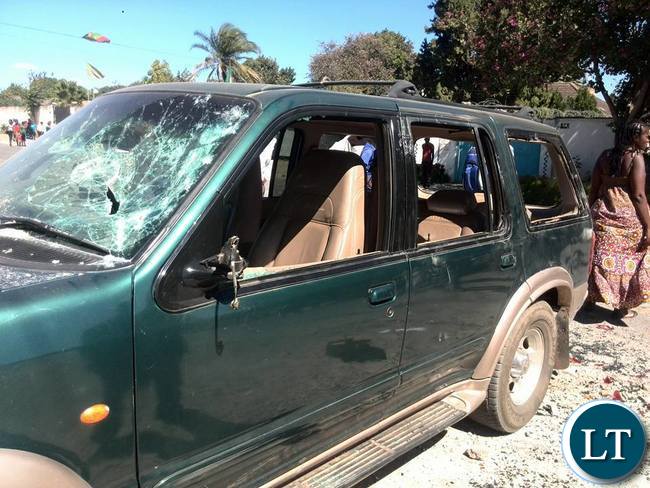 Smashed vehicles at the UPND Secretariate