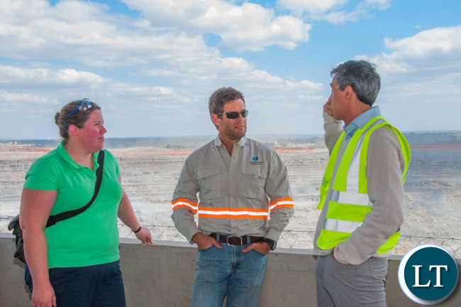 Head of the Office of the High Commission of Canada in Lusaka Amy Galigan, right, views First Quantum Minerals' Kansanshi mine with Kansanshi Assistant General Manager Meiring Burger.