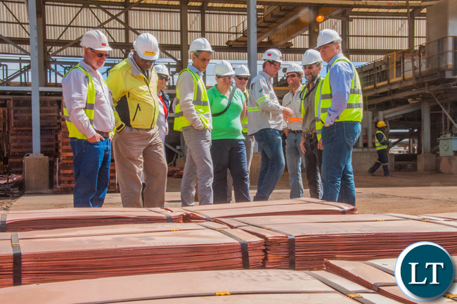 Head of the Office of the High Commission of Canada in Lusaka Amy Galigan inspects copper at First Quantum Minerals' Kansanshi mine. Head of the Office of the High Commission of Canada in Lusaka Amy Galigan inspects copper at First Quantum Minerals' Kansanshi mine.