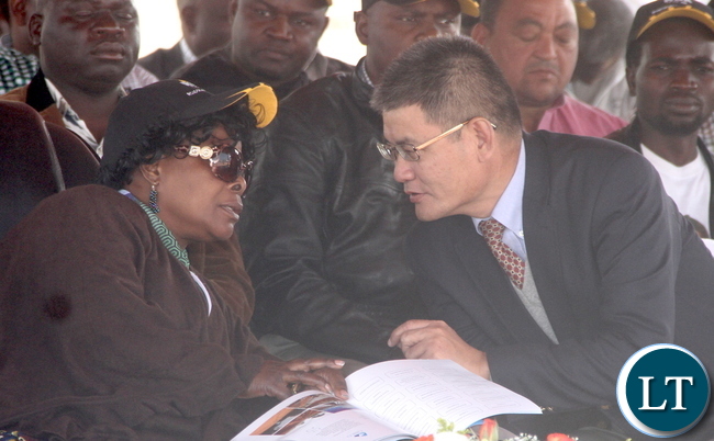First Lady Esther Lungu speaks with Chinese Ambassador to Zambia Yang Youming during the Commissioning of Mansa-Luwingu Road in Luwingu on Monday, July 18,2016 –Picture by THOMAS NSAMA