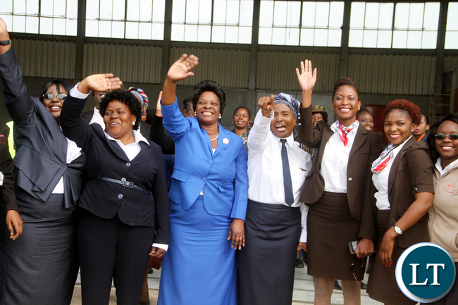 First Lady Esther Lungu and other women waves during the official Launch of Women in Aviation Zambia Chapter at Kenneth Kaunda International Airport on Thursday, July 14,2016 -Picture by THOMAS NSAMA