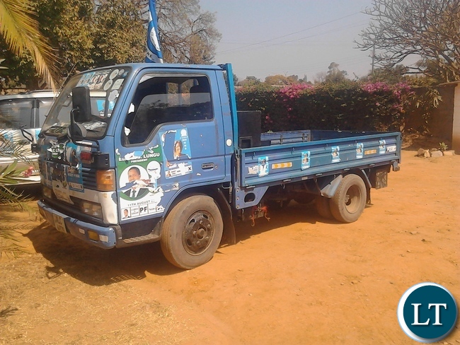Damaged posters of the President on the MMD campaign van
