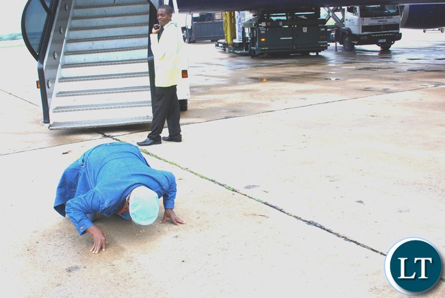Kissing Zambian soil