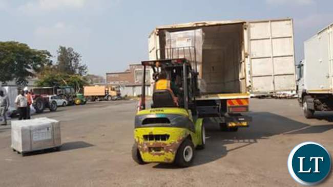 Offloading of ballot papers from the cargo plane and loading onto ECZ trucks for the 2016 general elections at KKIA