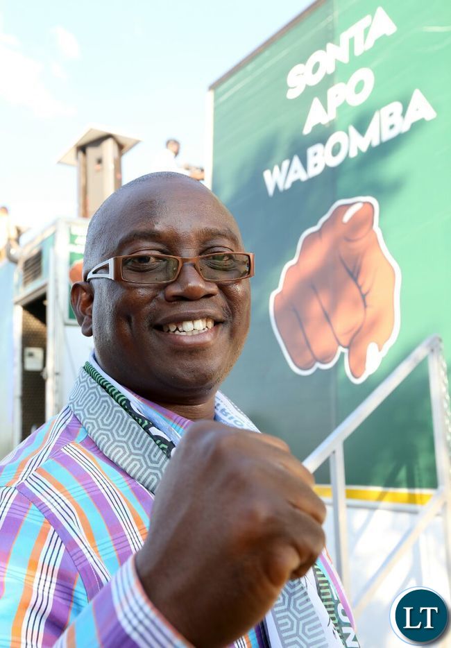 PF Kasama Central MP Kelvin Sampa shows the PF symbol during the rally