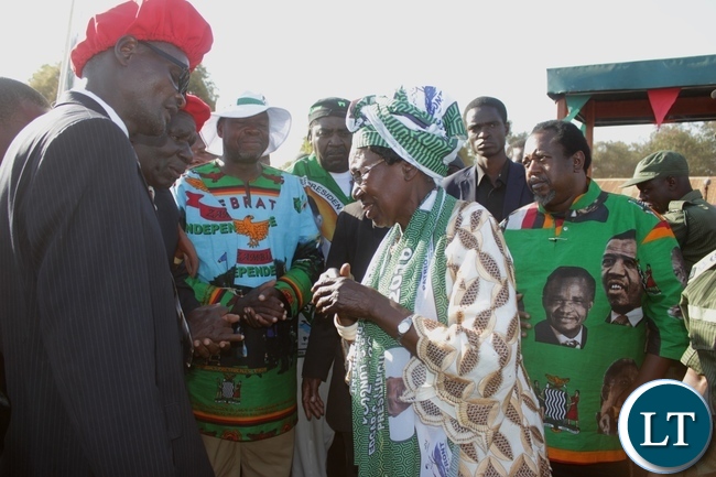 PF Presidential Running Mate, Vice President Inonge Wina (c) talking to Barotse Royal Establishment Indunas as PF Mangango Constituency aspiring candidate Robert Chiseke (in white hat) and Kaoma Central Constituency aspiring candidate Austin Liato (r) look on after a rally at Kaoma Airstrip in Western Province PF Presidential Running Mate, Vice President Inonge Wina (c) talking to Barotse Royal Establishment Indunas as PF Mangango Constituency aspiring candidate Robert Chiseke (in white hat) and Kaoma Central Constituency aspiring candidate Austin Liato (r) look on after a rally at Kaoma Airstrip in Western Province