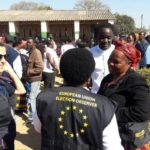 EU EOM Zambia Chief Observer Cecile Kyenge talks to voters  waiting to cast their votes-in Lusaka.