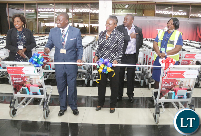 L-R Zambia Airport Corporation Limited Managing Director Mr Robinson Msitala;Vodafone Zambia Sales & Distribution Director Mrs Leah Kooma and Prosign Zambia Managing Director Michael Musonda.