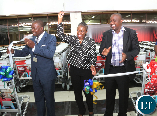 L-R Zambia Airport Corporation Limited Managing Director Mr Robinson Msitala;Vodafone Zambia Sales & Distribution Director Mrs Leah Kooma and Prosign Zambia Managing Director Michael Musonda.