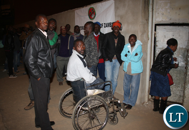 Voters waiting the polling station to be opened.