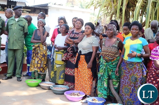 WOMEN lining up with traditional food to be offered to the ancestral spirits at Ng'ona river by the Mwata. WOMEN lining up with traditional food to be offered to the ancestral spirits at Ng'ona river by the Mwata.